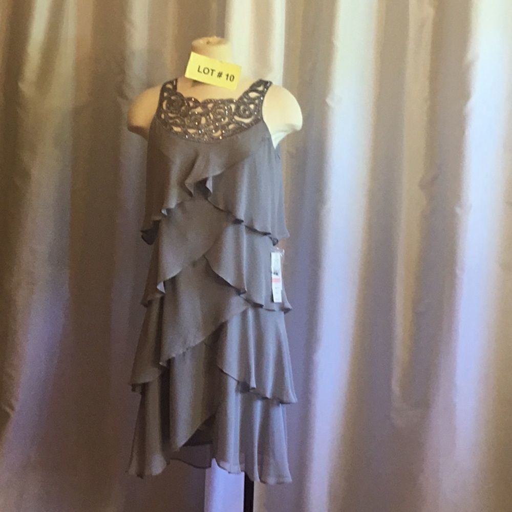 NWT cocktail dress in size 10 by SL FASHIONS from MACYS